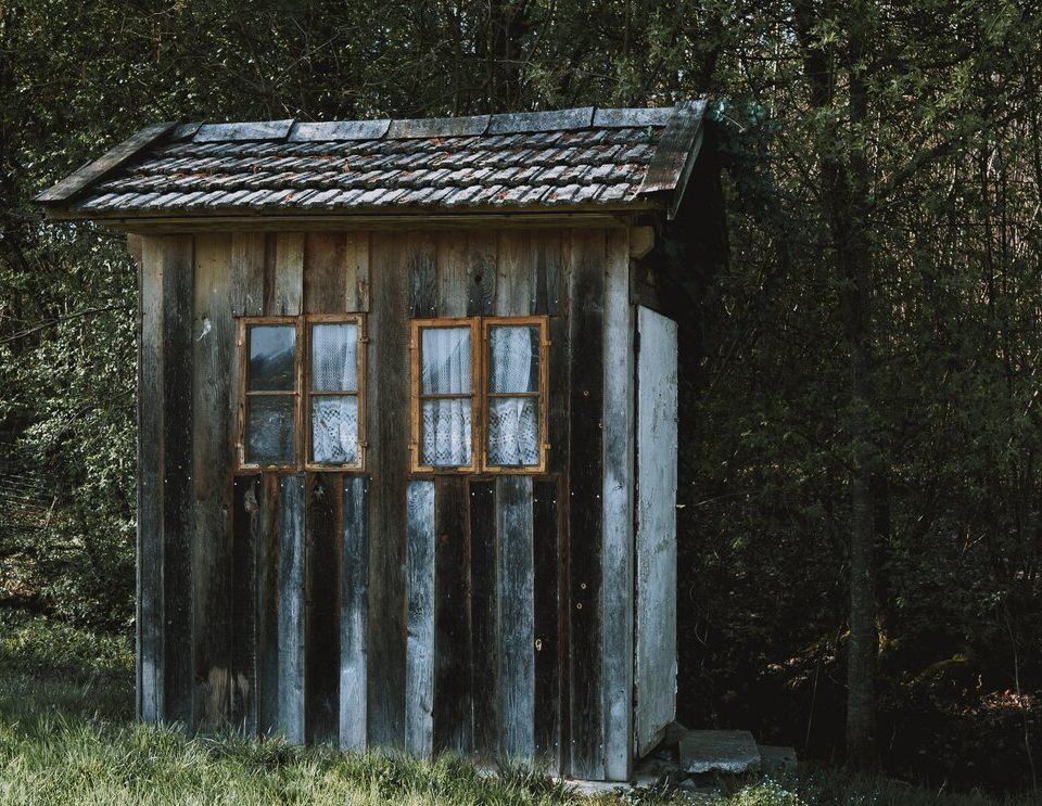 Wooden shed in winter