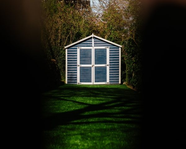 where to place a shed in your backyard
